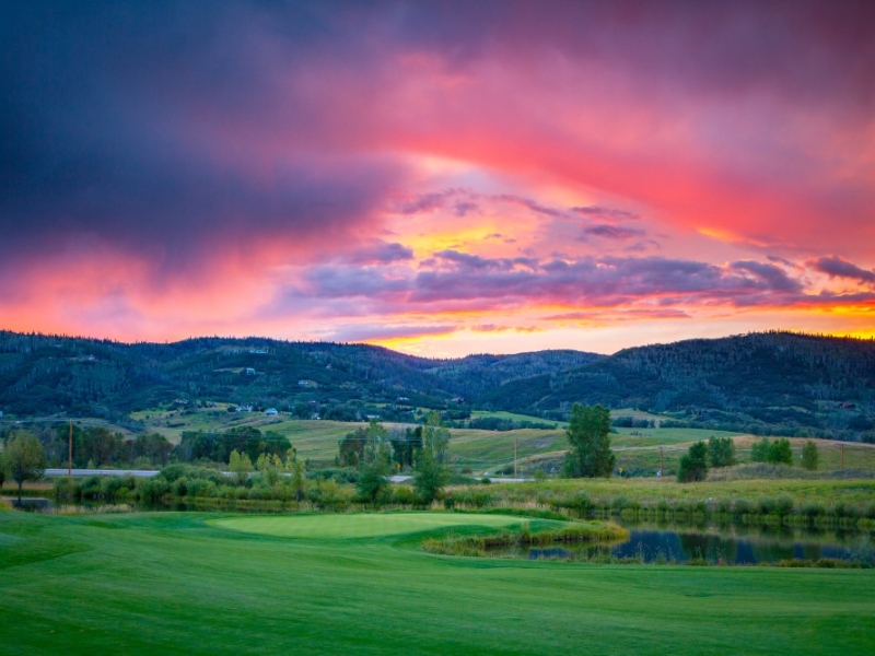Golf hole at sunset
